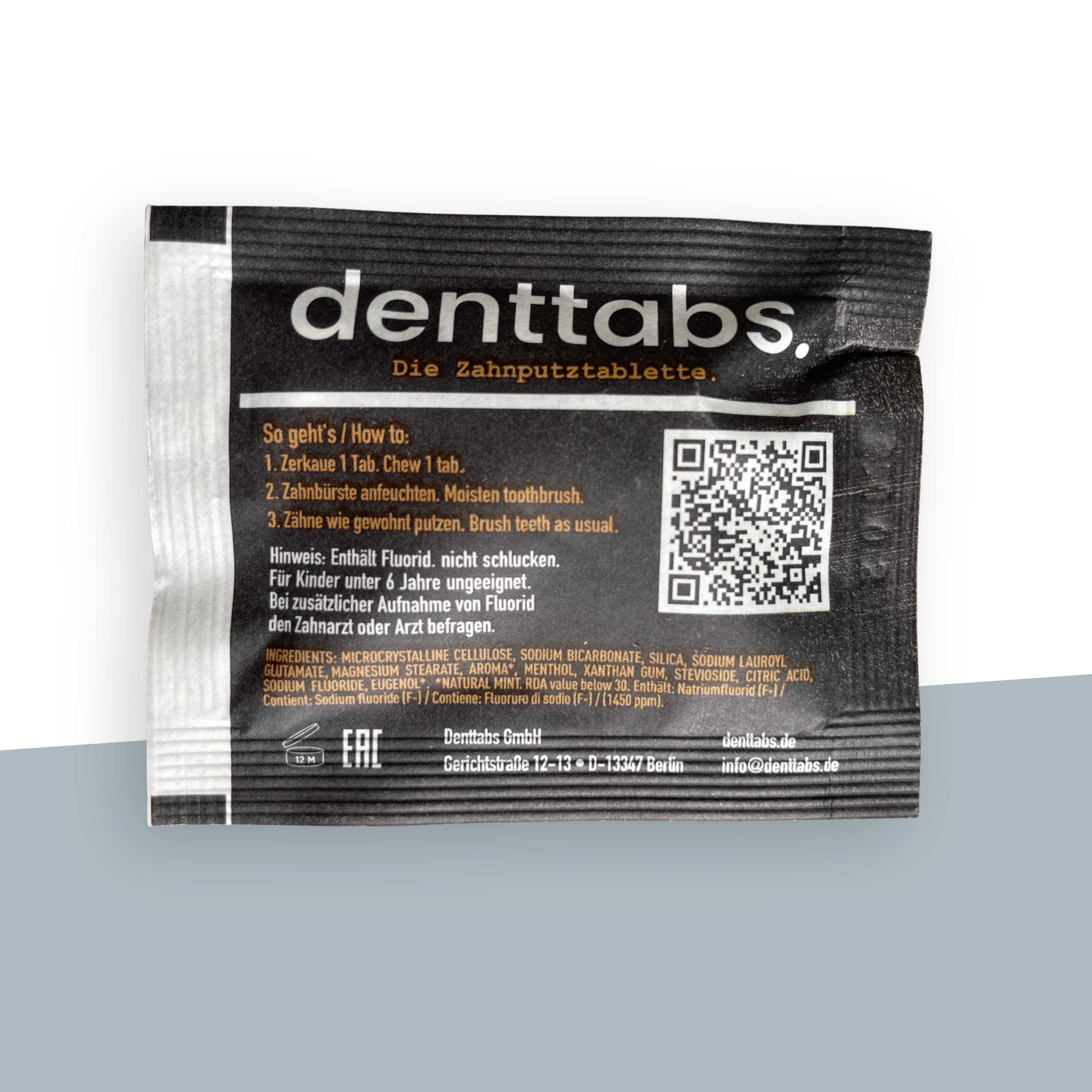 Denttabs Probiertüte Mint mit Fluorid und 10 Zahnputztabletten.